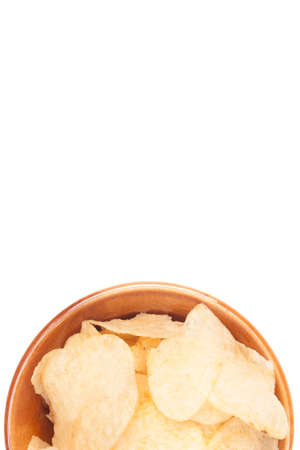 half potato chips bowl on white background not isolatedの写真素材