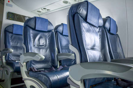 Interior of the plane. Empty chairsの写真素材