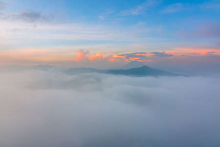 Indonesia. Bromo Tengger Semeru National Park. A thick fog at dawn with a view to the Semeruの写真素材