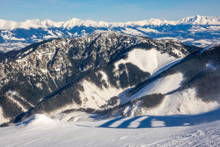 Slovakia. Low Tatras. Snowy winter peaks in sunny weather and valleys forest