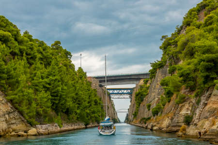 Greece. Corinth Canal in cloudy weather. Several bridges. Sailing yachtの写真素材