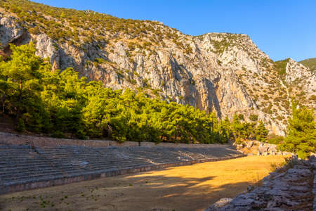 Greece. Delphi. A small ancient stadium at the foot of the mountain. Summer sunny day