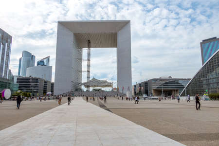 France. Summer day in the Parisian district of Defense. Grande Arche and the pedestrian square