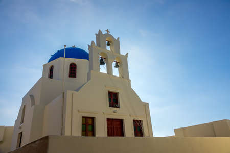 Greece. Sunny day on Santorini. Active church in backlightの写真素材