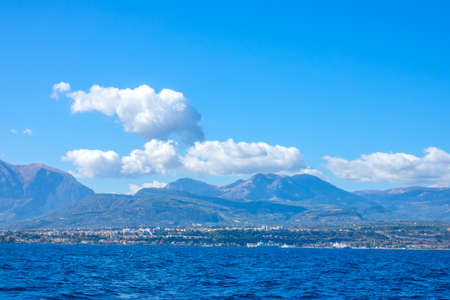 Greece. The shore of the Gulf of Corinth on a sunny summer day. View from the water