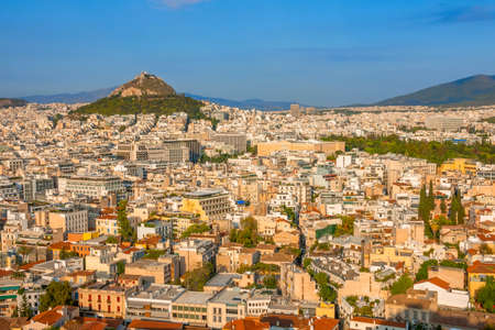 Greece. Summer evening in Athens. View of the city and Lycabettus hill from a heightの写真素材