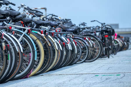 Netherlands. Cloudy day in Amsterdam. Large bike parking