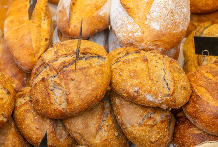 Netherlands. Farmers market in Amsterdam. Many loaves of breads close-upの写真素材