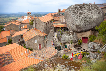 Portugal. Sunny summer day in the small mountain town of Monsanto. Huge stones and red roofsの写真素材