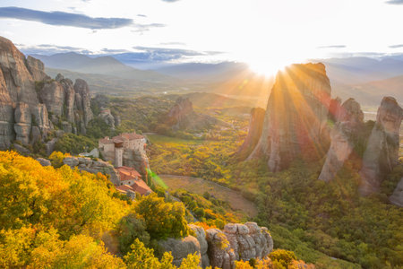 Mountains of Thessaly in Northern Greece. Summer sunset over a rock monastery in the Meteora Valleyの写真素材