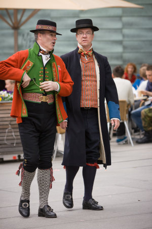 OSLO / NORWAY - May 17, 2010: National day in Norway. Norwegians at traditional celebration and parade on Karl Johans Gate street.のeditorial素材
