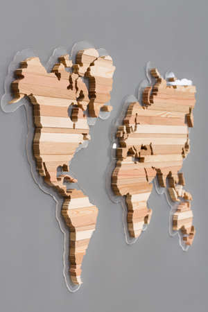 Handmade wooden map for home decoration. Art and abstract. Different types of wood in shape or...