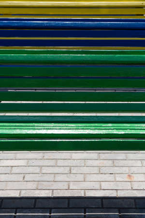 Top view on colorful bench on a sunny summer day. Background.の写真素材