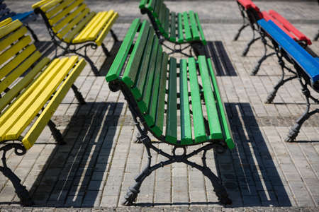 Colorful benches on a sunny summer day. Background.の写真素材