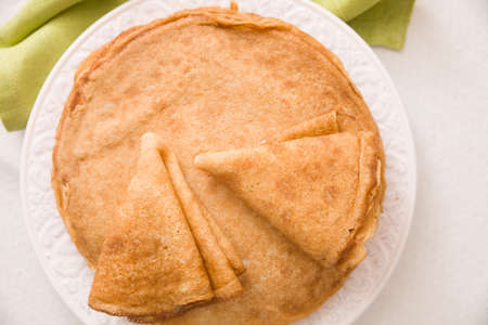 Top view on  pancakes on the plate. Dessert and homemade snacks. Healthy eating.