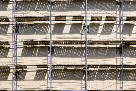 Closeup of scaffolding used as the temporary support building structure during construction. Also used as working platform for workers to work.の写真素材