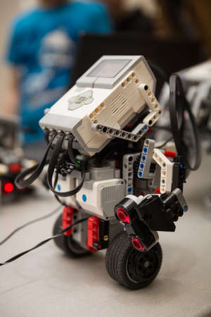 Cyber machine with a programmable module and dynamic stabilization technology. A robot made of cubes and wheels. Robotics.の写真素材