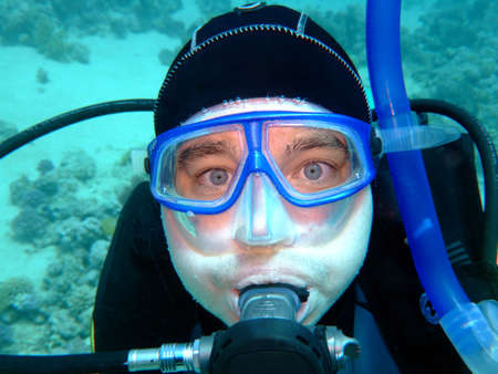 diver in deep with the scared eyesの写真素材