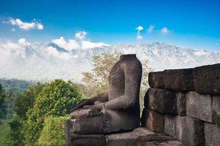 Buddha statue? mountain on background. Borobudur. Java. Indonesiaの写真素材