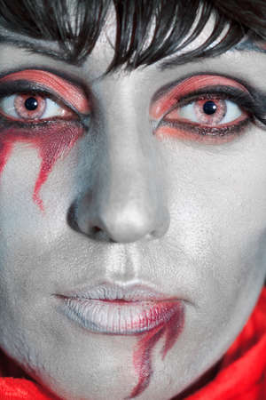 Woman as a vampire. Halloween face artの写真素材