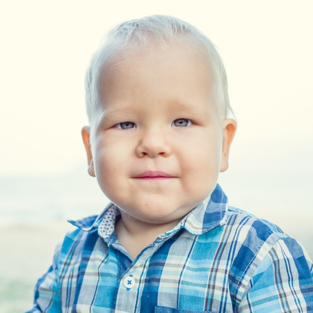 Cute caucasian baby outdoor portrait