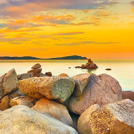 Amazing landscape at sunset. Stones on the foreground.の写真素材