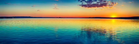 Sunset over the lake in Russia. Amazing landscape panorama