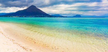 Sandy tropical Wolmar beach at sunny day. Beautiful landscape. Panorama. Mauritiusの写真素材