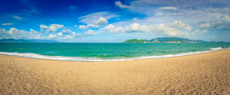 Scenic view of Nha Trang beach at sunny day. Beautiful tropical landscape. Panoramaの写真素材