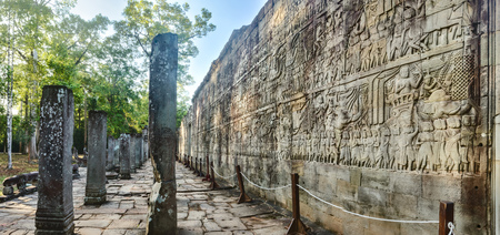 Bas-relief at Bayon temple in Angkor Thom at morning time. Siem Reap. Cambodia. Panoramaの写真素材