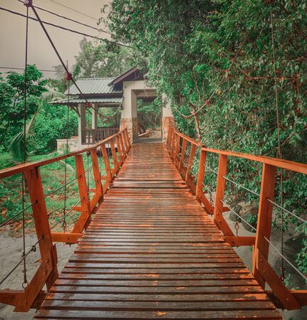 Footbridge at Penang national park at rainy day, Malaysiaの写真素材