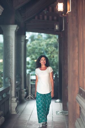 Outdoor portrait of a beautiful smiling senior womanの写真素材