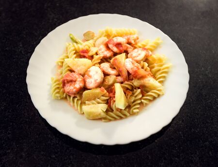 Seafood pasta in sweet and sour sauce. Asian styleの写真素材
