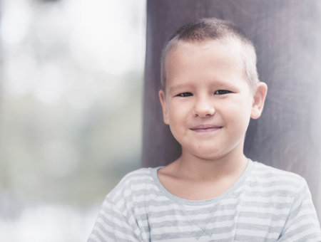 Outdoor portrait of a little cute boyの写真素材