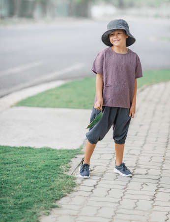 Outdoor portrait of a little cute boyの写真素材
