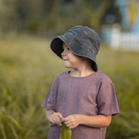 Outdoor portrait of a little cute boyの写真素材