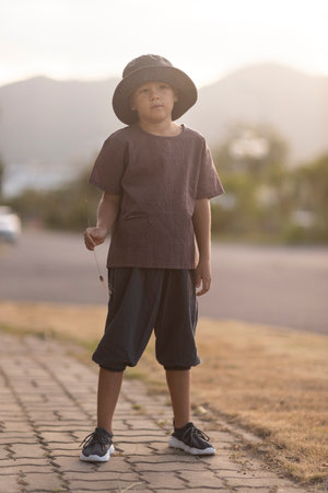 Outdoor portrait of a little cute boyの写真素材