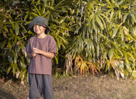Outdoor portrait of a little cute boyの写真素材