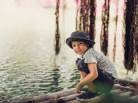 Outdoor portrait of a cute boy smilingの写真素材