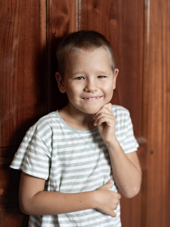 Indoor portrait of a cute boy smilingの写真素材
