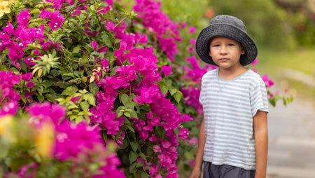 Outdoor portrait of a cute boy in hatの写真素材