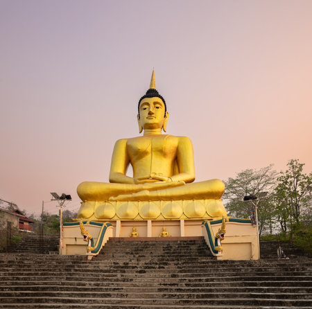 Golden Buddha overlooking Pakse at Wat Phousalao. Laosの写真素材