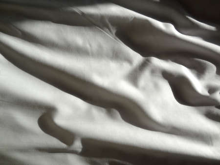 Pattern of sheet folds in strong sunlight