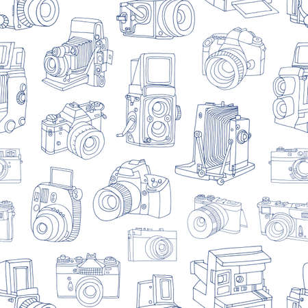 Monochrome seamless pattern with old and digital photo cameras hand drawn with blue contour lines on white background. Vector illustration in doodle style for wallpaper, wrapping paper, backdrop.のイラスト素材