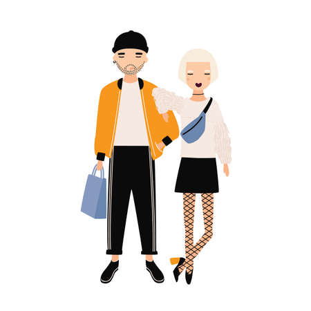 Hipster boy and girl dressed in trendy clothes standing together. Modern boyfriend and girlfriend....
