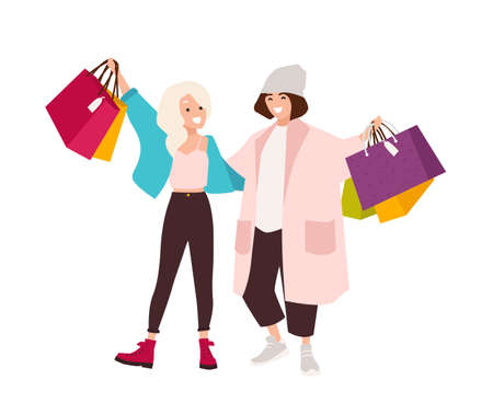 Pair of happy teenage girls carrying shopping bags. Smiling young women holding their purchases. Pair of shopaholics. Funny cartoon characters isolated on white background. Flat vector illustrationのイラスト素材