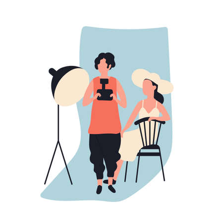 Professional female photographer holding photo camera and model at photographic studio full of photography equipment. Cute young woman and her creative hobby. Flat cartoon vector illustrationのイラスト素材