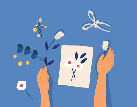 Hands creating decorative craftwork or handiwork - flower applique, herbarium, scarpbooking. Creative workshop lesson or tutorial. Leisure hobby activity. Flat cartoon colorful vector illustrationのイラスト素材