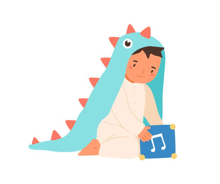 Cute little boy wearing dinosaur costume playing with music box vector flat illustration. Adorable toddler in romper suit sitting with toy cube isolated on white. Lovely child in funny apparelのイラスト素材