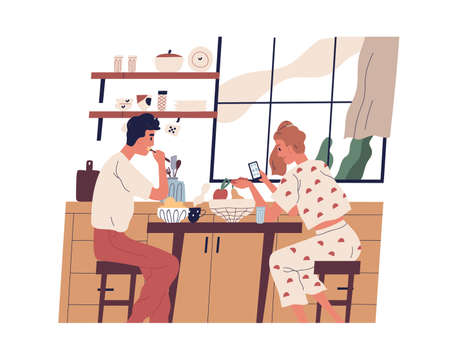 Couple having breakfast or lunch at home. Young people eating food and surfing the internet on mobile phone in modern kitchen. Colorful flat vector illustration isolated on white backgroundのイラスト素材